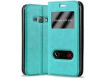 Cadorabo Custodia Protettiva Per Samsung Galaxy J1 2016 Cover In Turchese Custodia Per Telefono Cellulare Custodia A Libro Cover Case