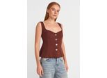 Figurbetonte äRmellose Peplum-Bluse