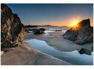 Wallario Wandfolie, Sonnenuntergang hinter einem Felsen am Strand