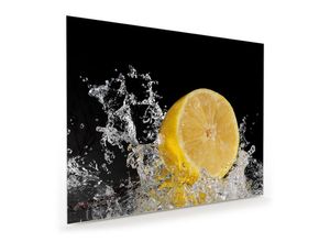 Primedeco Glasbild Wandbild Zitrone auf Wassersplash mit Aufhängung