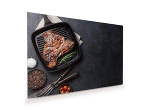 Primedeco Glasbild Wandbild T-Bone Steak in Pfanne mit Aufhängung