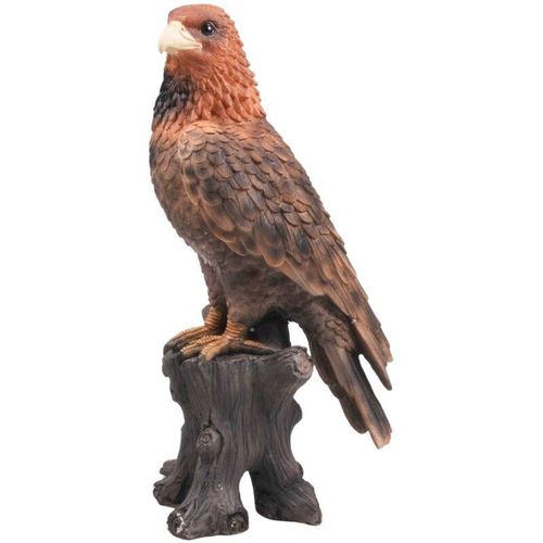 Adler aus Harz auf Baumstamm Steinadler