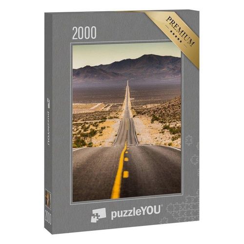 puzzleYOU Puzzle Endlos gerade Straße im Staub