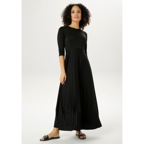 Maxikleid ANISTON CASUAL, Damen, Gr. 48, N-Gr, schwarz, Web, Obermaterial: 100% Polyester, unifarben, leicht glänzend, modisch, figurbetont knöchelfrei, Rundhals, 3/4-Ärmel, Kleider, Rockteil mit Volant aus Plissee