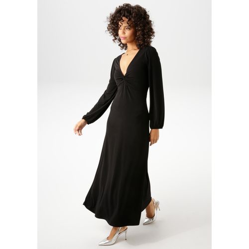 Maxikleid ANISTON CASUAL, Damen, Gr. 42, N-Gr, schwarz, Single Jersey, Obermaterial: 95% Polyester, 5% Elasthan, unifarben, leicht glänzend, feminin, figurbetont knöchelfrei, V-Ausschnitt, Langarm elastischer Bund mit Gummizug, Kleider, mit raffiniertem Knoten am Dekolleté