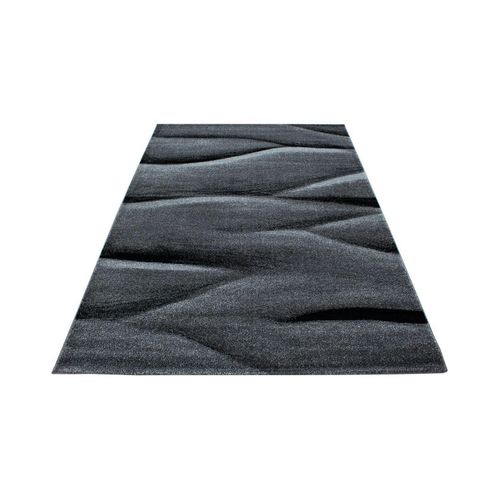 Stilvoller Designer-Kurzflorteppich mit Wellenmuster in Schwarz und Grau