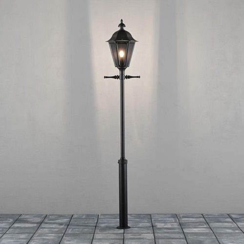 Konstsmide Pallas Standleuchte schwarz lackiertes Aluminium, rauchfarbenes Acrylglas, Hand EU 550-750
