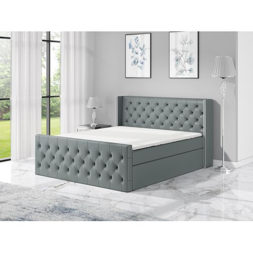 Boxspringbett BOKO 140x200 mit 2 Bettkästen, Bonell-Matratze und Topper. Dekorative Stifte an den Seiten der Kopfstütze. Bett Komplett-Set mit Matratze,Bettkasten & Kopfteil. Stoff Eko Cayenne. Elegantes Bett mit massives Kopfteil.