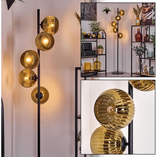 Cesaro Stehlampe aus Metall/Riffelglas in Schwarz/Goldfarben