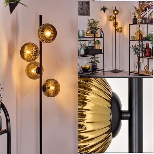 Cesaro Stehlampe aus Metall/Riffelglas in Schwarz/Goldfarben