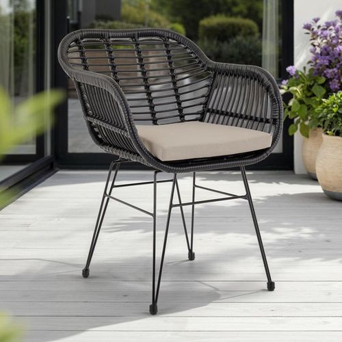 Gartenstuhl PARAMO aus Polyrattan, schwarz/beige - moderner Esszimmerstuhl in Rattan Optik, Küchenstuhl mit Sitzkissen, Korbstuhl mit robustem Metallgestell