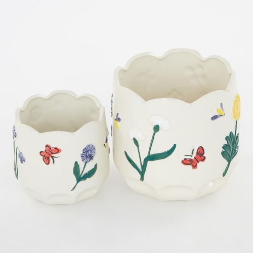 Kleiner beigefarbener Blumentopf