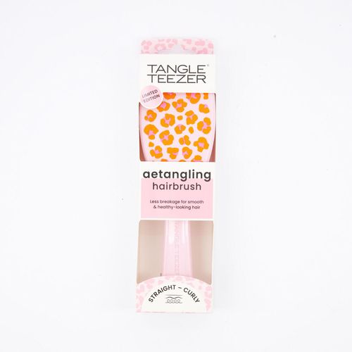 Rosa-orangefarbene Haarbürste mit Leopardenmuster
