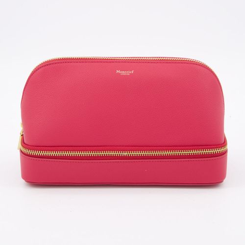 Dunkelrosa Kosmetiktasche mit goldfarbenen Elementen