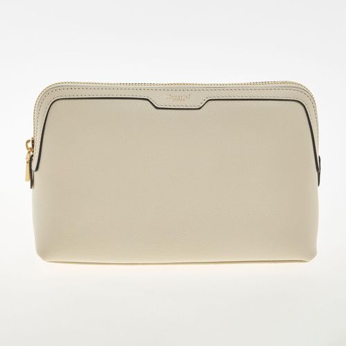 Beigefarbene Kosmetiktasche mit goldfarbenen Akzenten