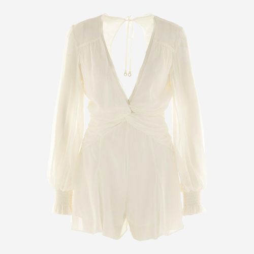 Weißer Jumpsuit mit offenem Rücken Image