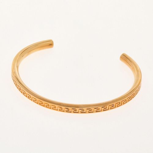 Goldfarbener Armreif mit griechischem Muster