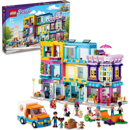 LEGO 41704 Friends Wohnblock in Heartlake City mit Friseursalon und Café, Puppenhaus mit 7 Minipuppen, Hausmodell mit Wohngebäuden, Geschenkidee Weihnachten