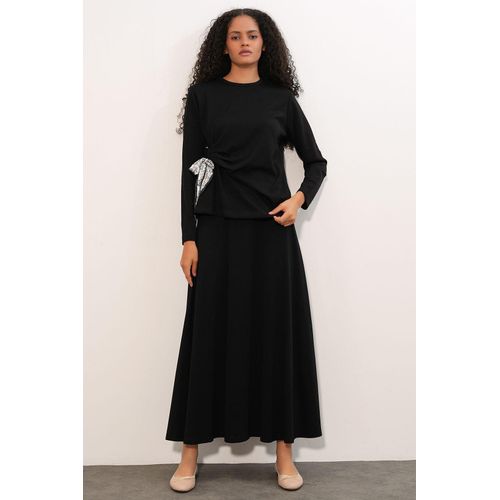 Langärmlige Bluse und weite Hose Koordinatensatz