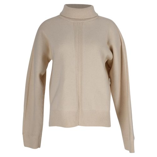 Gebreide trui met col en open rug van Jil Sander in crèmekleurige wol.