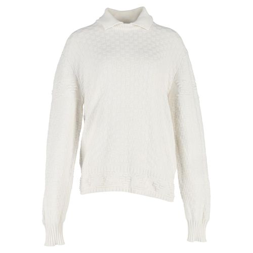 Louis Vuitton trui met kraag van witte wol.