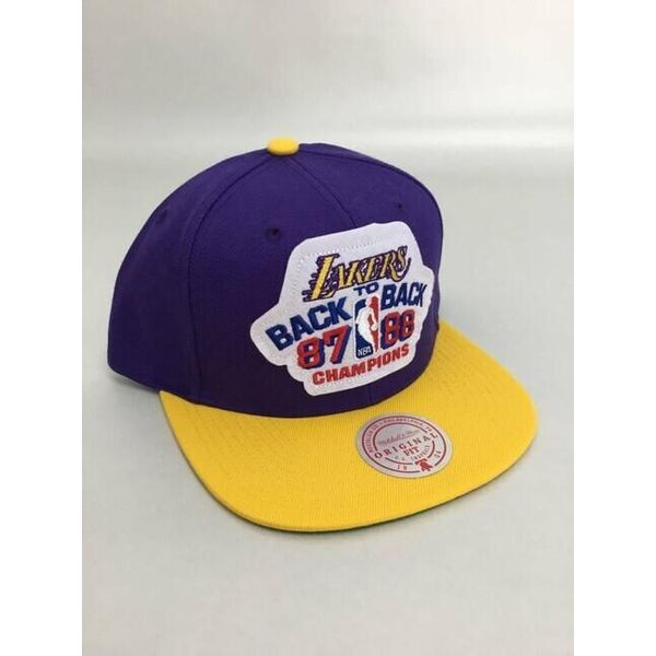 KšIltovka Mitchell & Ness Snapback Los Angeles Lakers B2B Snapback Viola/Giallo - Uni-image