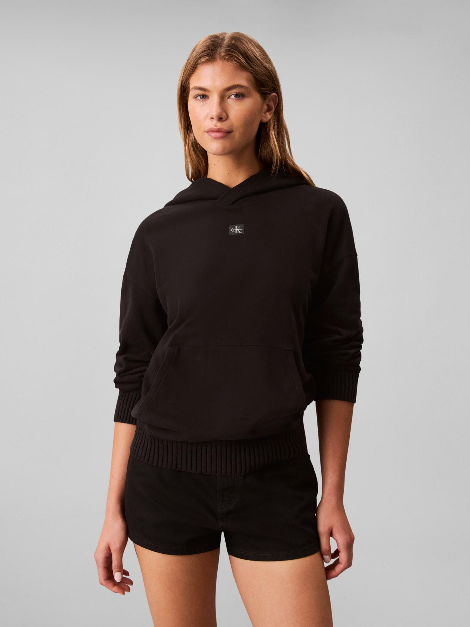 Sweatshirt Calvin Klein Jeans, Damen, Gr. M (40), Schwarz, Sweatware, Obermaterial: 100% Baumwolle, Unifarben, Regular Fit HüFtlang, Rundhals, BüNdchen, Sweatshirts Sweatshirt, Mit Kapuze, Regular Fit, Gewebtes Markenlabel