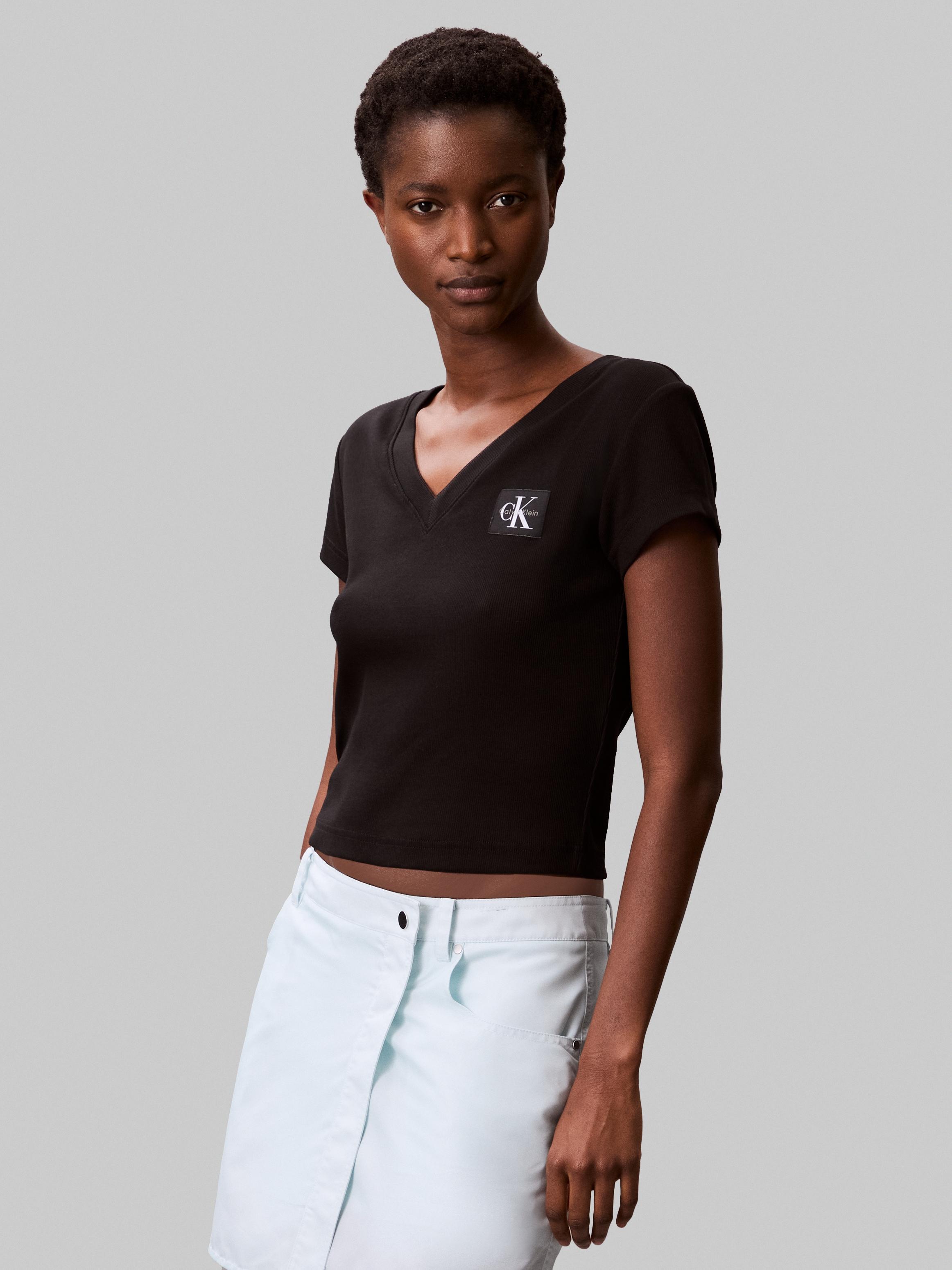 T-Shirt Calvin Klein Jeans "A- SS Woven Label RIB Vneck Tee", Damen, Gr. M (40), Schwarz, Rippware, Obermaterial: 95% Baumwolle, 5% Elasthan, Unifarben, Figurbetont Taillenbedeckt, V-Ausschnitt, Shirts T-Shirt, Mit Gewebtem Label